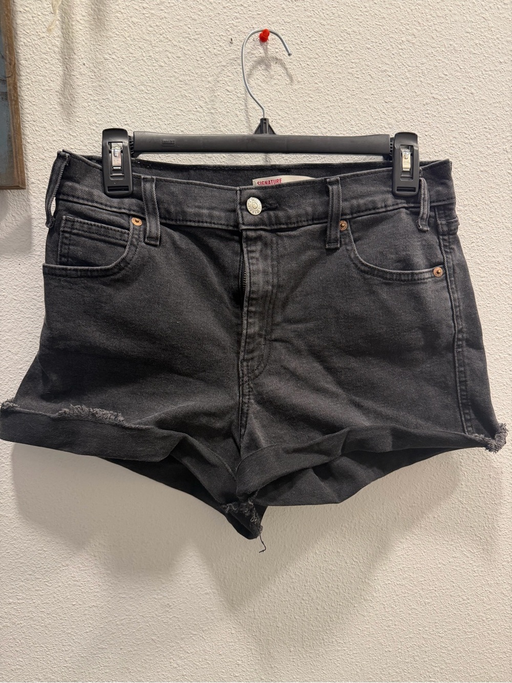 Levi's Black Denim Cutoff Shorts with Raw Hem
